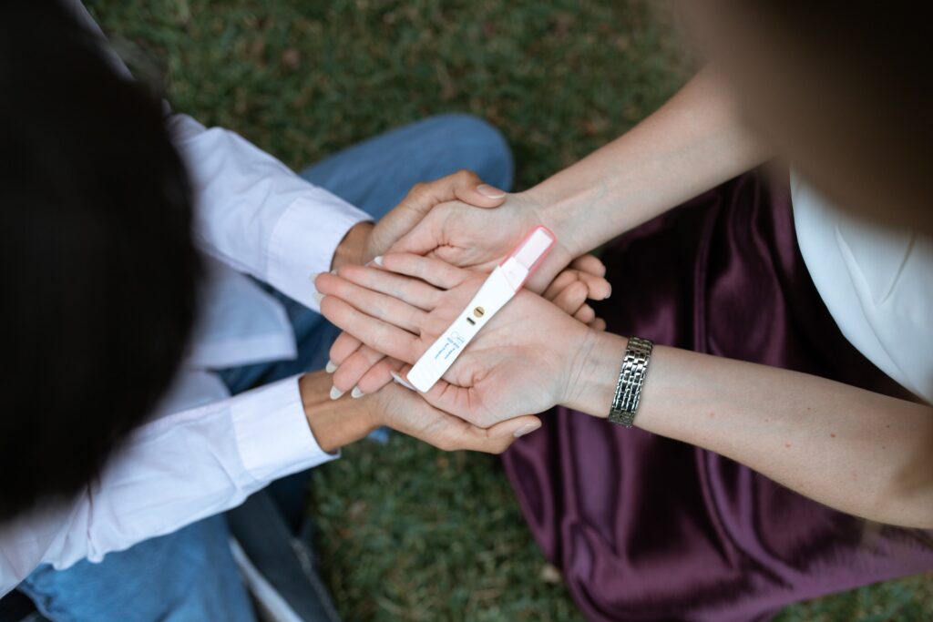 Acupuncture in Fertility - Two People Looking at a Pregnancy Kit Result